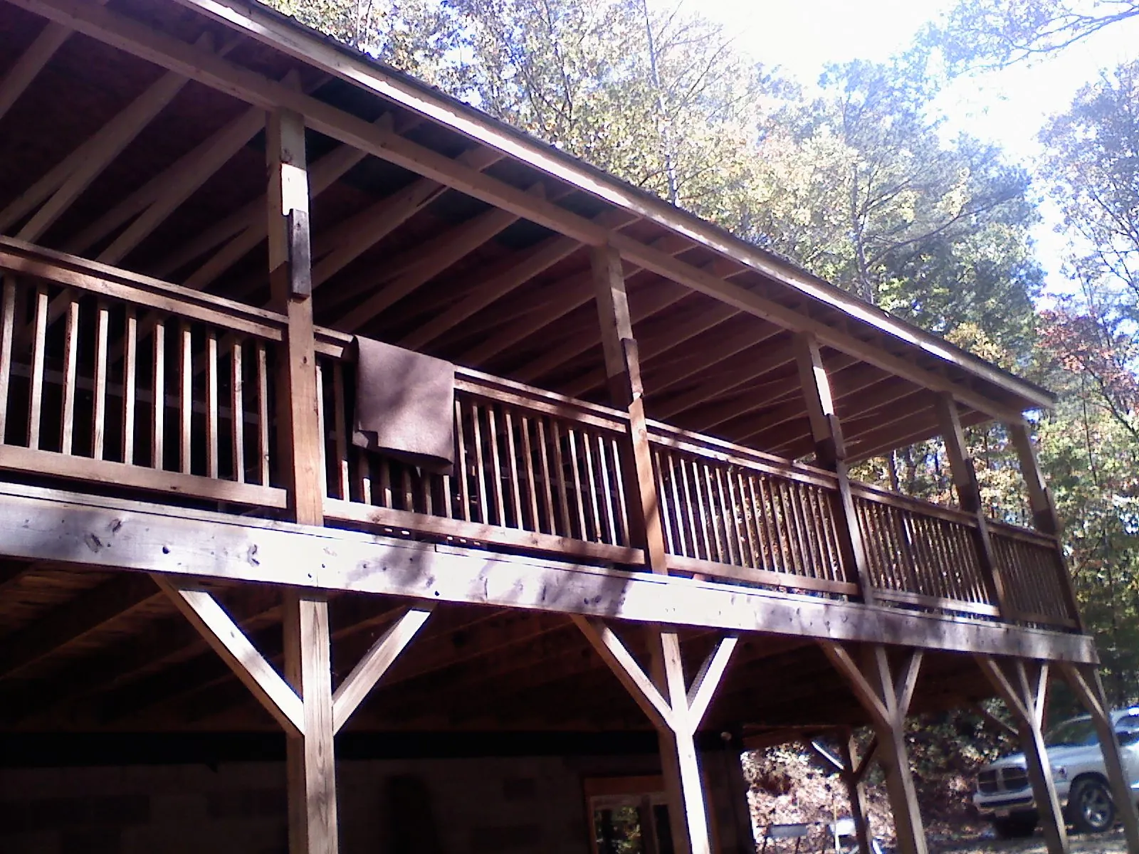 Timber framing under a new elevated porch and deck — Roof Leak Repair in Tillamook by Roofing Brothers